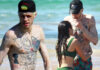 Pete Davidson and bikini-clad Chase Sui share a tender embrace in the ocean on romantic Hawaiian getaway... after denying romance rumors